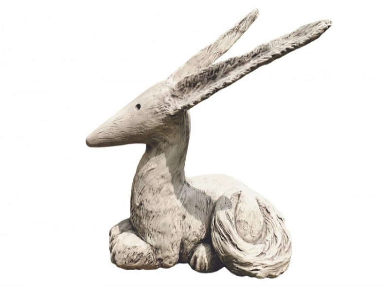 Statue renard Assis